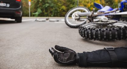 Man,On,The,Street,After,Fatal,Car,And,Motorcycle,Accident
