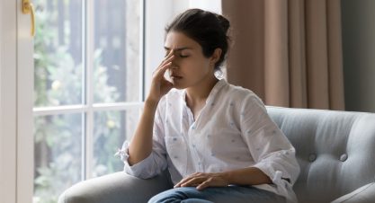 Depressed,Frustrated,Young,Indian,Woman,Suffering,From,Headache,,Migraine,,Touching